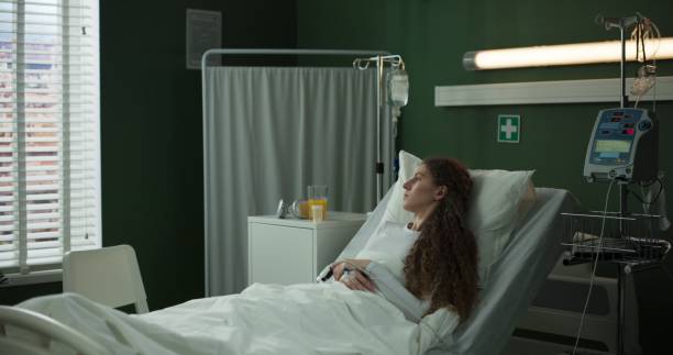 istock Doctor arrives with documents for the patient to sign 2196825306