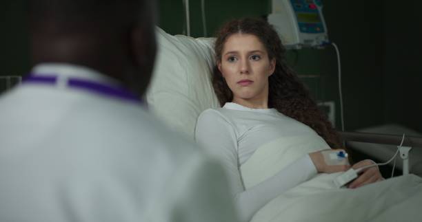 istock Patient and doctor talk about the next steps in her care 2196826093