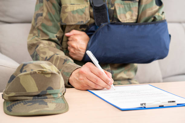 istock handicapped soldier with arm sling 2196827653