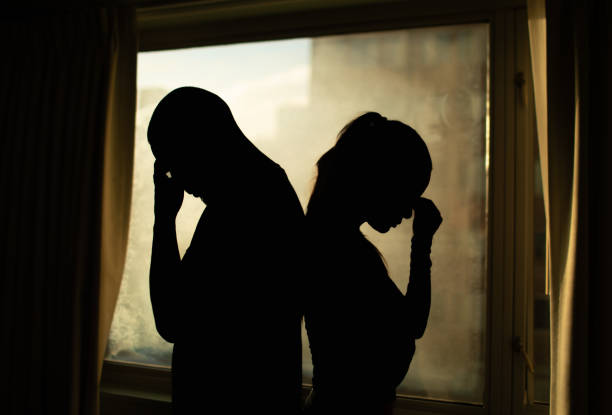 istock Silhouette of a young couple upset, having disagreement, relationship problem, misunderstanding. 2196828920