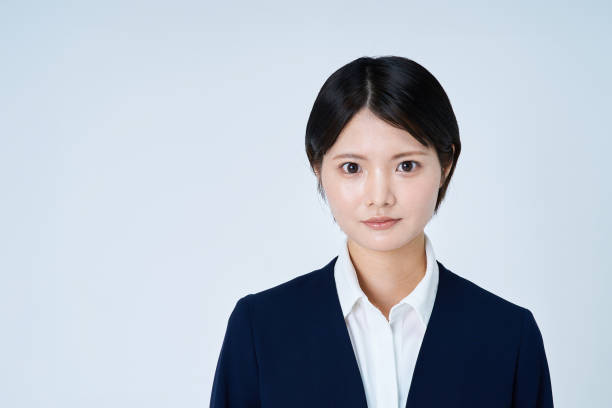 istock Young woman in a suit 2196829268