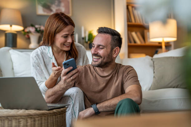 istock Browsing online and scrolling through phones on the sofa 2196835710
