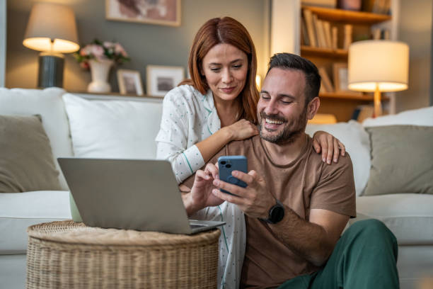 Browsing online and scrolling through phones on the sofa