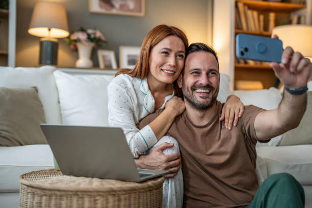 istock Loving couple taking a selfie together 2196835732