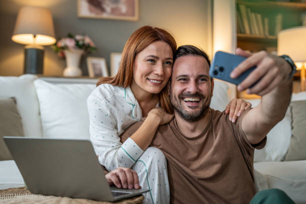 istock Loving couple taking a selfie together 2196835735