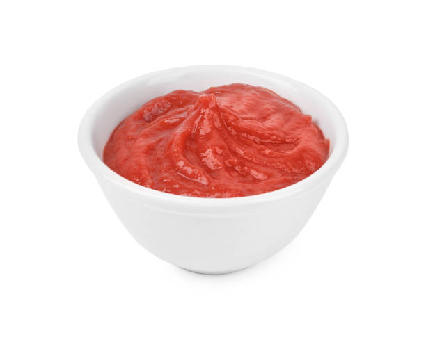 istock Organic ketchup in bowl isolated on white. Tomato sauce 2196836880