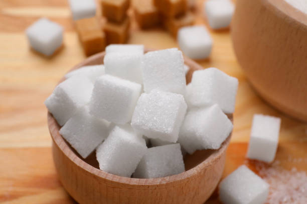 istock White sugar cubes in bowl on table, closeup 2196837893