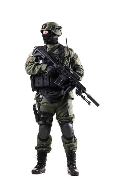 istock Military special forces soldier fully armed in tactical gear in action 2196839564