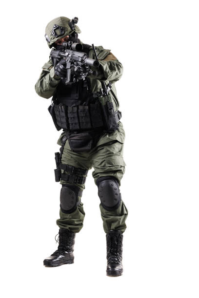 istock Tactical operative in full gear aiming a firearm during a military operation 2196839593