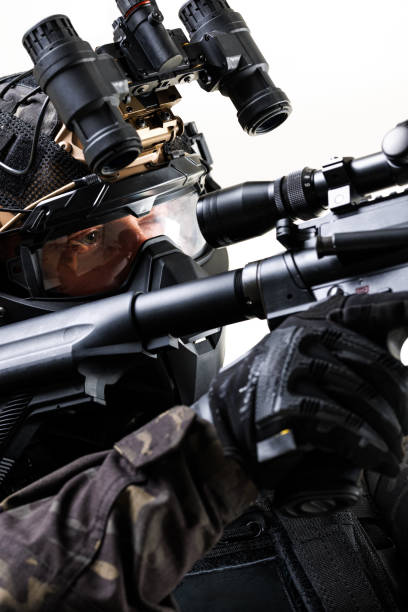 istock Military Specialist Equipped for Night Operations With Tactical Gear 2196839633