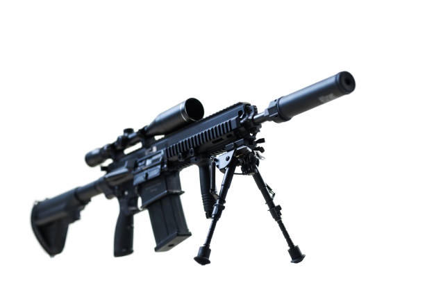 Tactical rifle highlighting its components, including a precision scope, suppressor, adjustable stock, and sturdy bipod, showcased in detailed resolution on a white isolated backdrop.