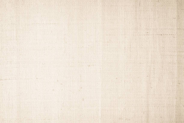 istock Brown sackcloth woven texture background in natural pattern. Jute hessian burlap, linen background in light beige cream color blank. Weaving canvas fiber line cotton cloth textured as organic. 2196840779