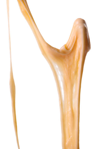 Stretching delicious melted cheese isolated on white