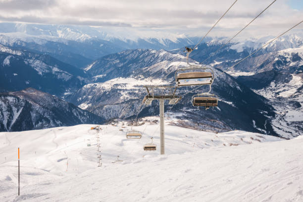 istock Ski resort slope and ski lft. Alpine ski / snowboard vacation. 2196841263