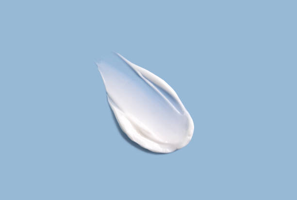 istock Cosmetic smear of cream texture on a blue background. Skin hydration. 2196848405