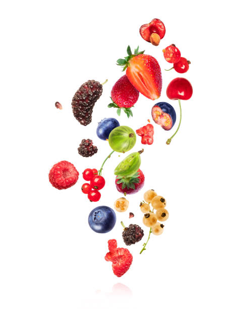 istock Various whole and sliced berries in the air isolated on a white background 2196849121