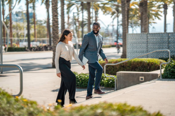 istock Dynamic Business Duo Taking Strides in Urban Setting 2196852338