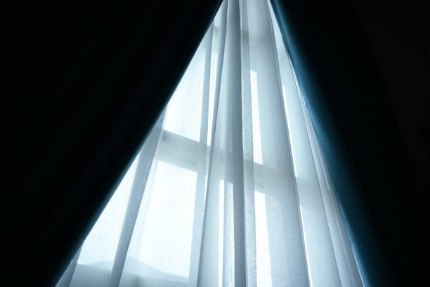 istock black and white curtain on the window in home, interior design 2196854252