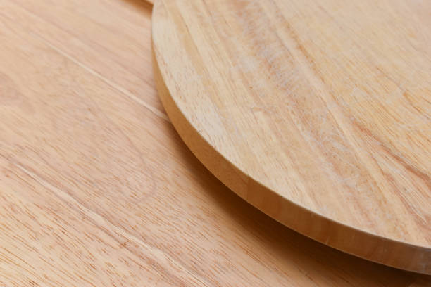 istock brown wooden sphere cuttingboard wood background 2196855898