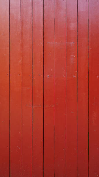 istock red wooden wall texture background of house vertical 2196868840