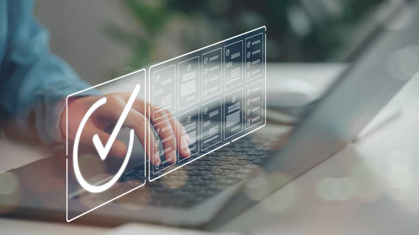 istock Document Management System (DMS) concept. Businessmen checklist, managing and accessing information in online exam standards, and document Control for company database access 2196869576