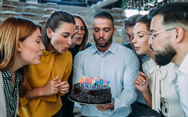 Team celebrating a birthday at the office.
