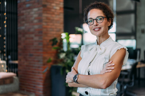 istock Confident businesswoman in modern office. 2196870516