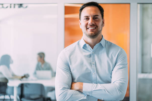 istock Confident businessman and his team. 2196870571