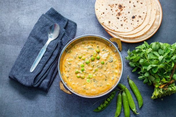 istock Creamy Methi Matar Malai Curry Served with Soft Roti or Chapati for a Delicious and Satisfying Meal Experience 2196871139