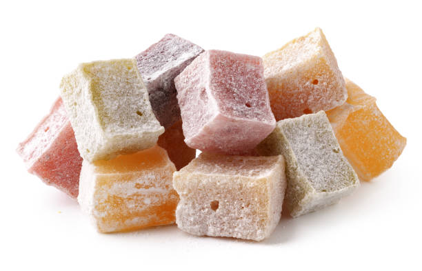 istock A vibrant assortment of Turkish delight cubes rests on a smooth surface, featuring a range of flavors including orange, rose, and lemon 2196872953