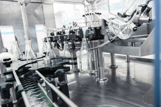 istock Advanced machinery for bottling beverages in a modern production facility during daylight hours 2196874037