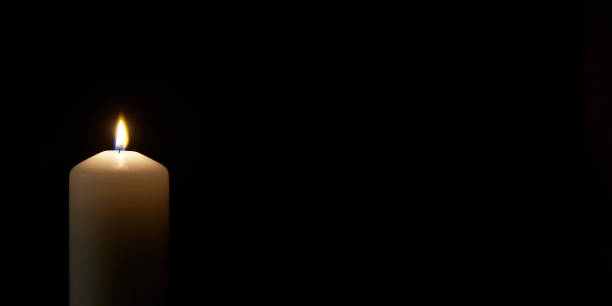 istock candle, candles, black background, death, grief, loss 2196874595