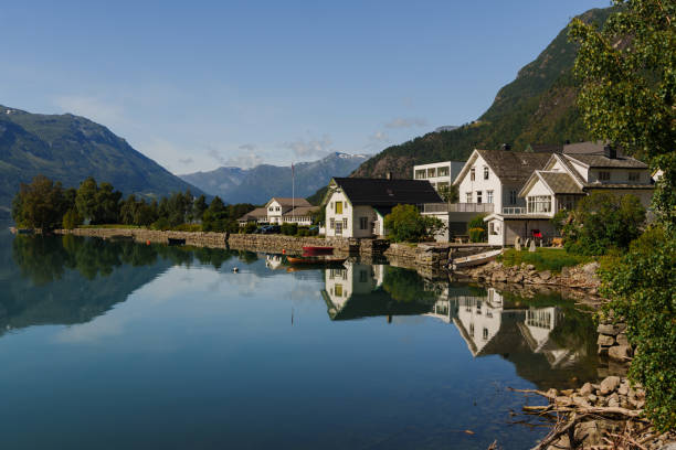 Quaint village  on the lake in Norway in summer