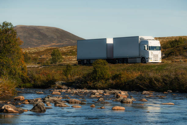 istock Truck with cargo freight traveling through wilderness in Norway 2196876453