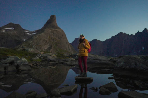 istock Portrait of woman exploring  the great outdoors in Norway at sunset 2196876607