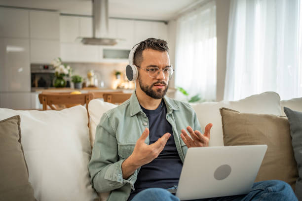 istock Young man having mental health online 2196880118
