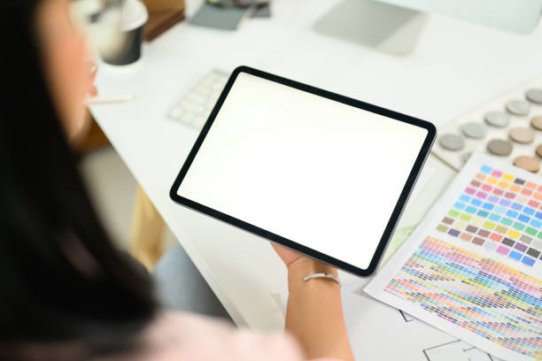 istock Close up of designer holding digital tablet with blank screen ready for sketching or design planning 2196880775