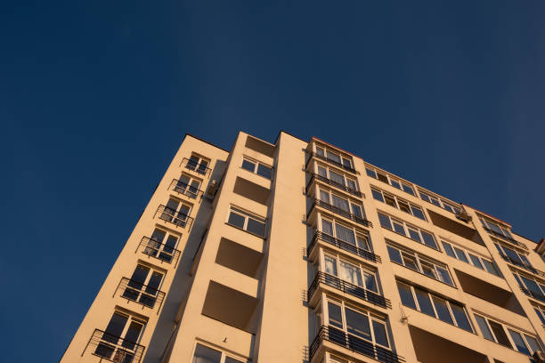istock Modern Apartment Building Against Blue Sky 2196886373