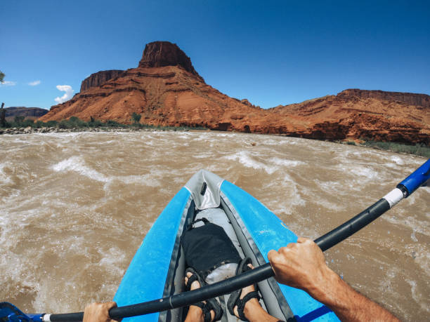istock Man POV rafting rapids with kayak in Colorado river 2196890326
