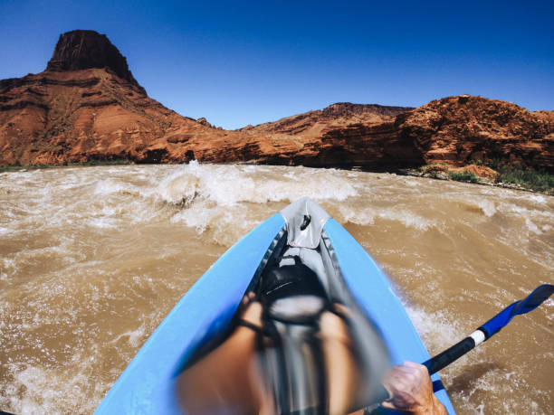 istock Man POV rafting rapids with kayak in Colorado river 2196890362