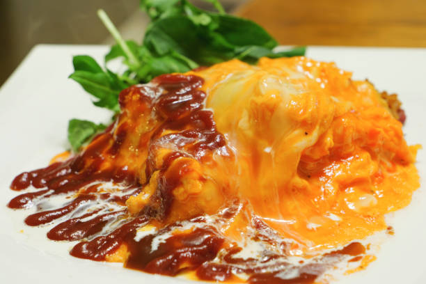 Delicious-looking omelette rice, freshly prepared with ketchup