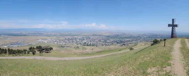 istock Cross on mount Yagluja overlooking old Rustavi, Georgia 2196894738