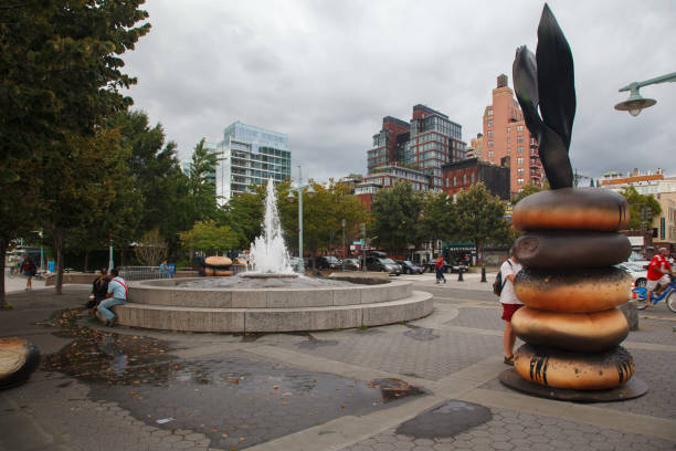 New York City, USA - July, 13th, 2015. Everything Bagel sculpture of styrene and polyurethane byHanna Liden in the Marsha P. Johnson Memorial Fountain, Greenwich Village, New York City