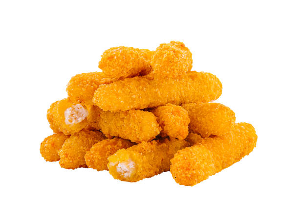 Crispy chicken tenders stacked on a white background ready for serving at a restaurant or home gathering