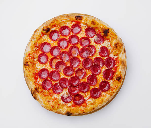 istock Freshly baked pepperoni pizza ready to be served at a cozy restaurant 2196902418