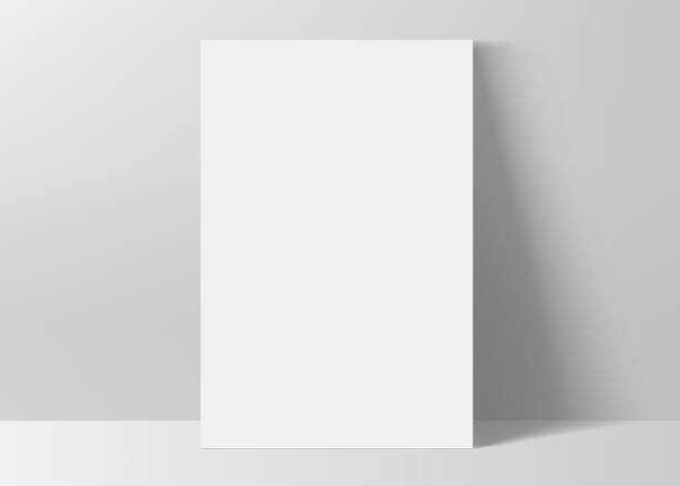 istock Vertical rectangle A4 paper format mock up. Sheet of paper portrait orientation 3d realistic mockup with shadow. Empty white poster template. Vector illustration. 2196903669