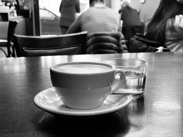 Cappuchino with a glass of water