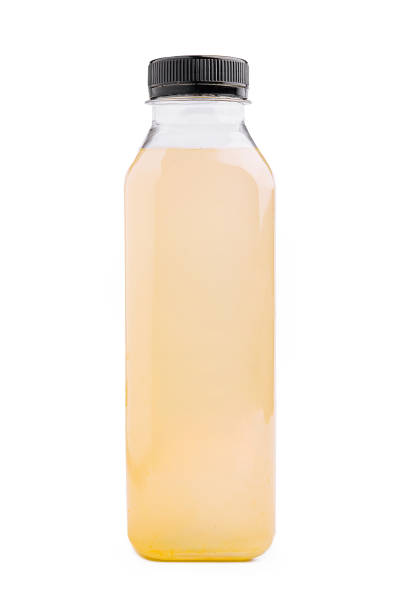 istock Clear liquid in a plastic bottle showcasing natural light and minimalistic design 2196905228