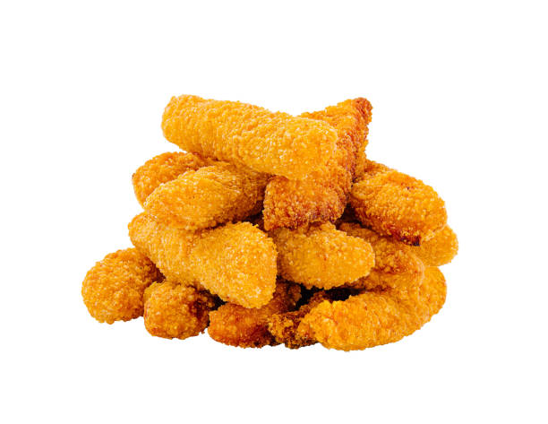 istock Crispy golden chicken strips stacked on a white background ready for serving or enjoying at a casual meal 2196906304
