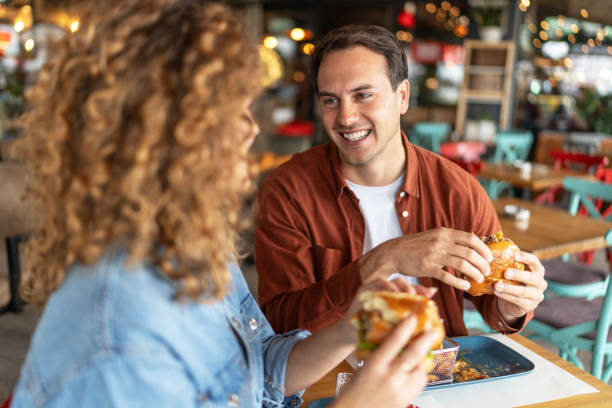 istock Happy couple in the restaurant 2196909468